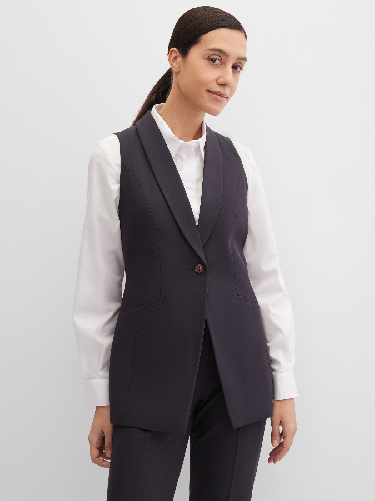 Жилет удлиненный без рукавов