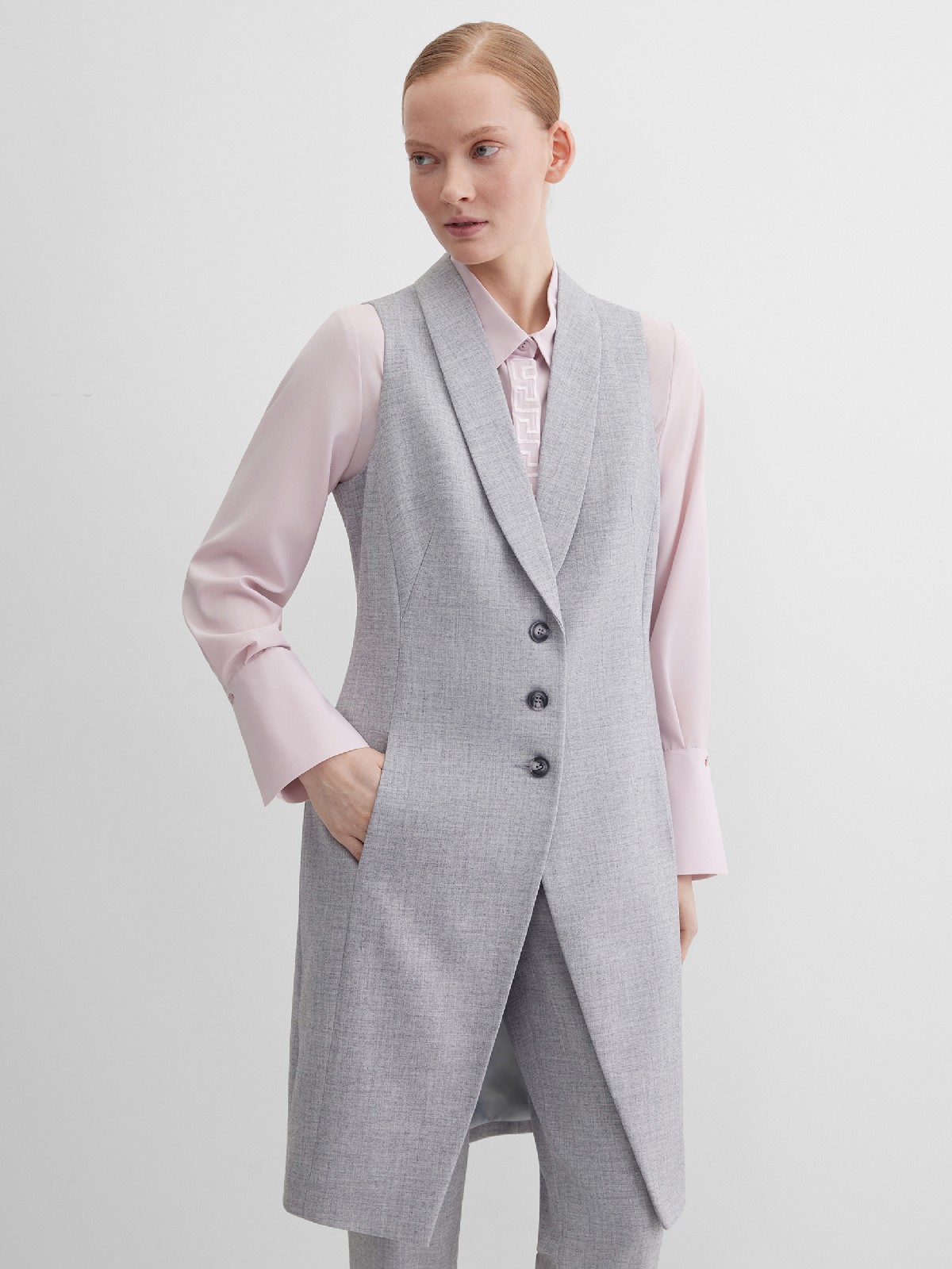 Жилет длинный с  внутренними карманами